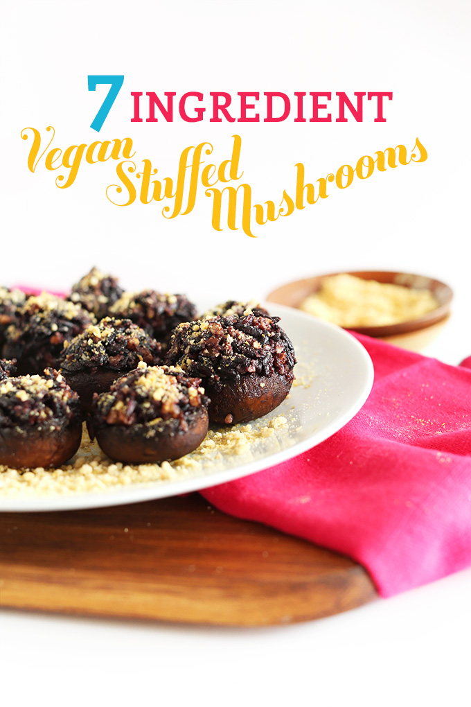 Plate of Vegan Stuffed Mushrooms topped with vegan parmesan cheese