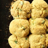 Baking sheet with six freshly baked Vegan Cheddar Jalapeno Biscuits
