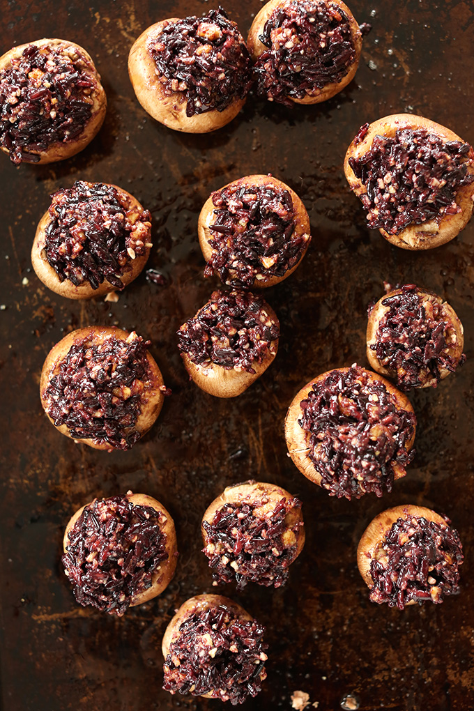 Baking sheet filled with a batch of our Easy Vegan Stuffed Mushrooms recipe