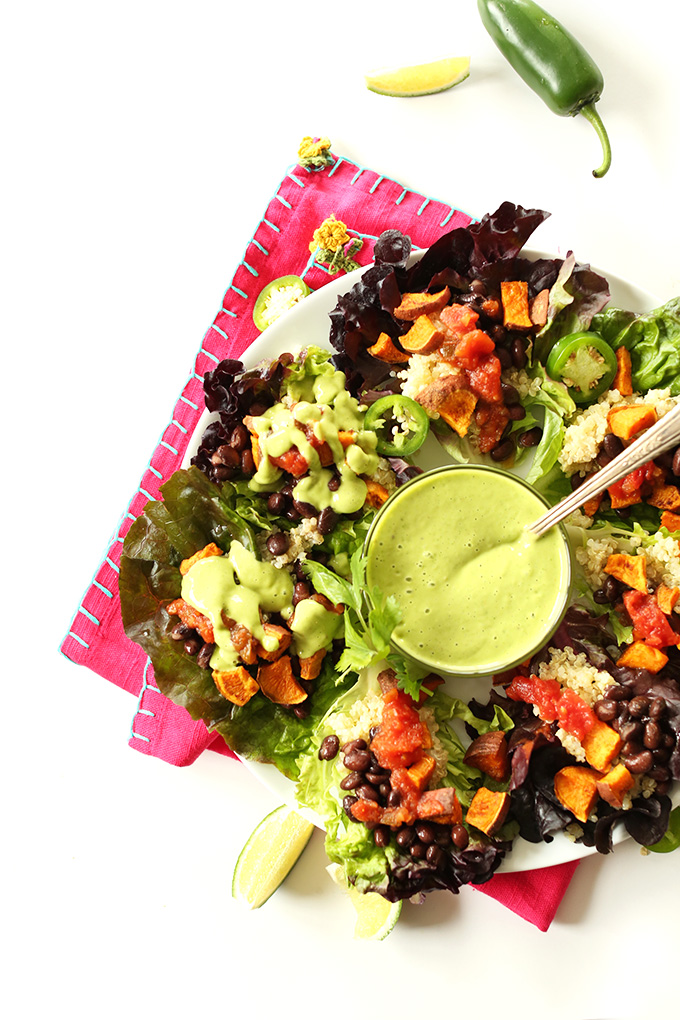 Bowl of Cilantro Lime Avocado Dressing surrounded by Mexican Lettuce Cups