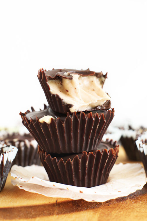 Stack of Vegan PB Mousse Cups with a crunchy chocolate shell and fluffy inside