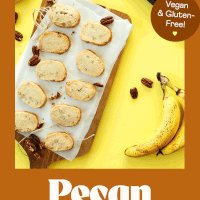 Bananas next to a board of homemade banana pecan shortbread cookies