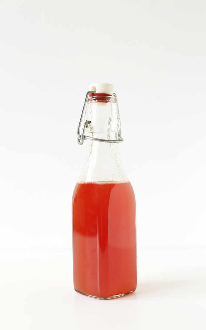 Bottle of homemade Peach Simple Syrup