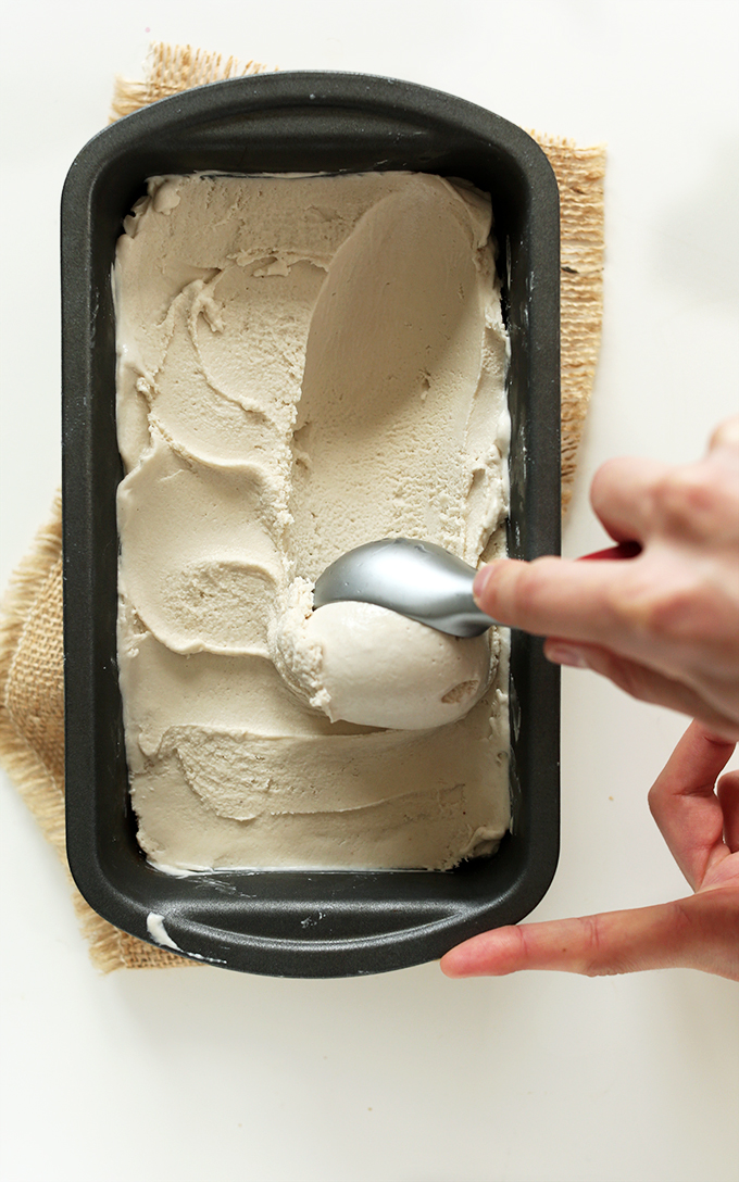 Grabbing a scoop of Vegan Bourbon Salted Caramel Ice Cream