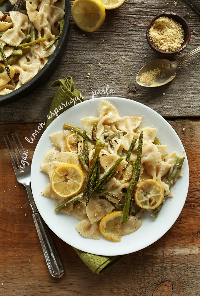 Plate of Vegan Lemon Asparagus Pasta with a side of vegan parmesan