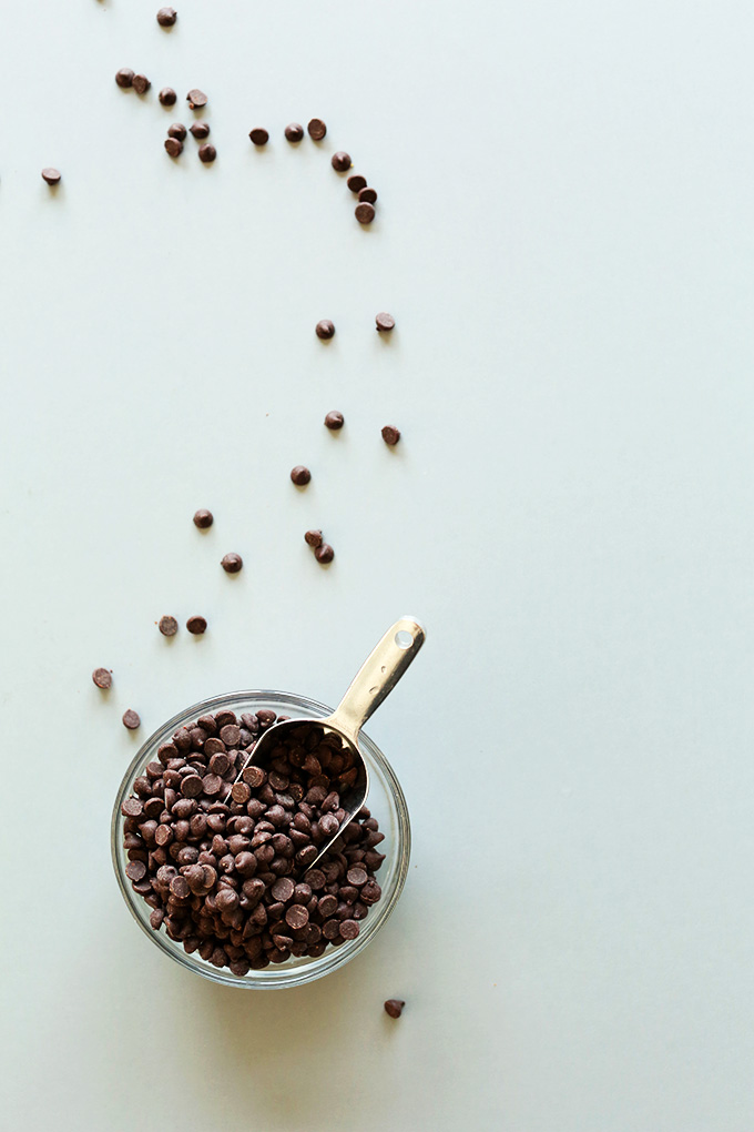 Bowl of vegan chocolate chips for making our Vegan Peanut Butter Cookie Dough Ice Cream recipe