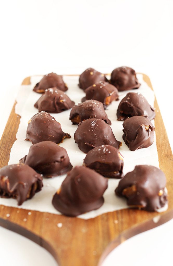 5 Ingredient Vegan Caramel PB Truffles! Crunchy dark choocolate shell, two layer CREAMY caramel Peanut Butter centers #vegan #glutenfree