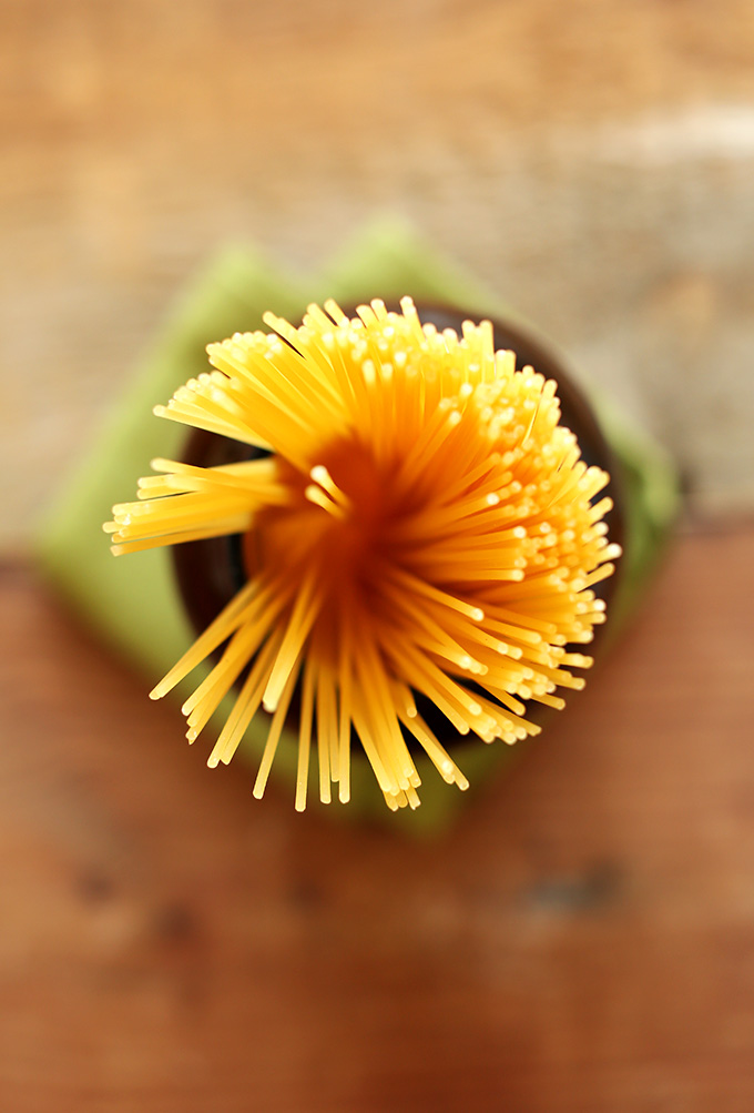 Jar of gluten-free spaghetti noodles for making delicious vegan red pepper pasta
