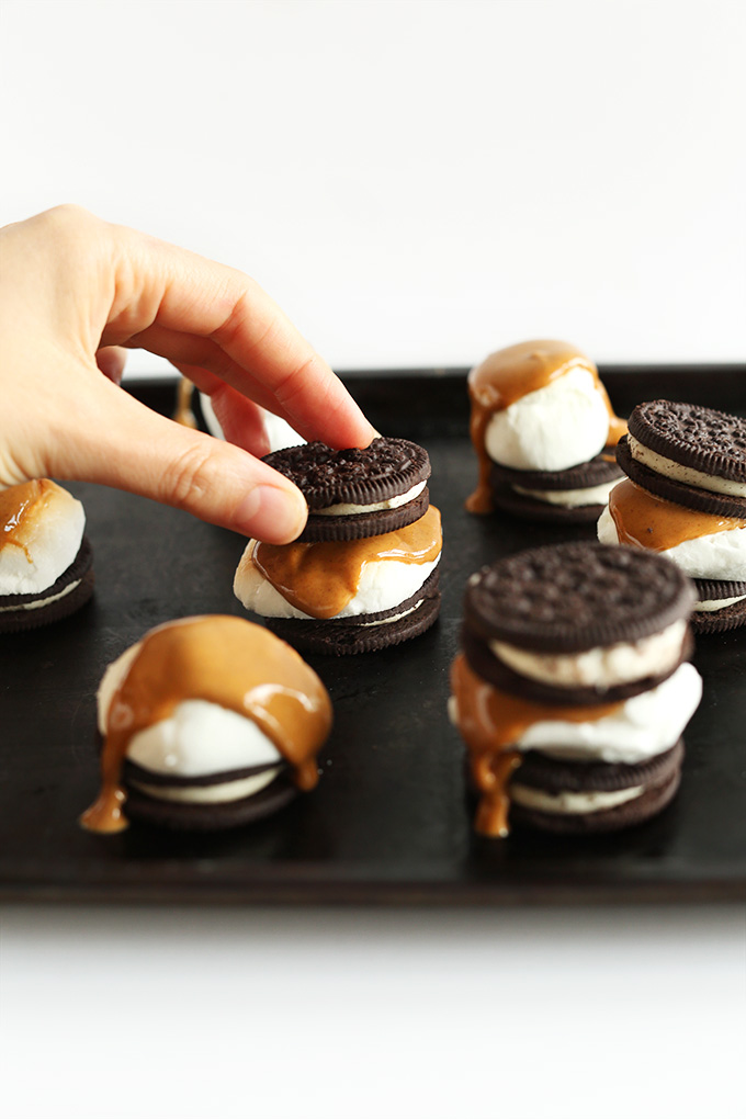 Placing the top oreo onto a Peanut Butter S'MOREO