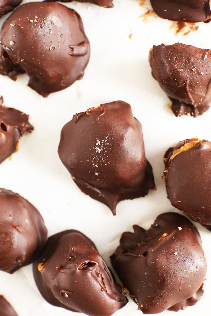 Homemade Vegan Caramel Peanut Butter Truffles on a white background
