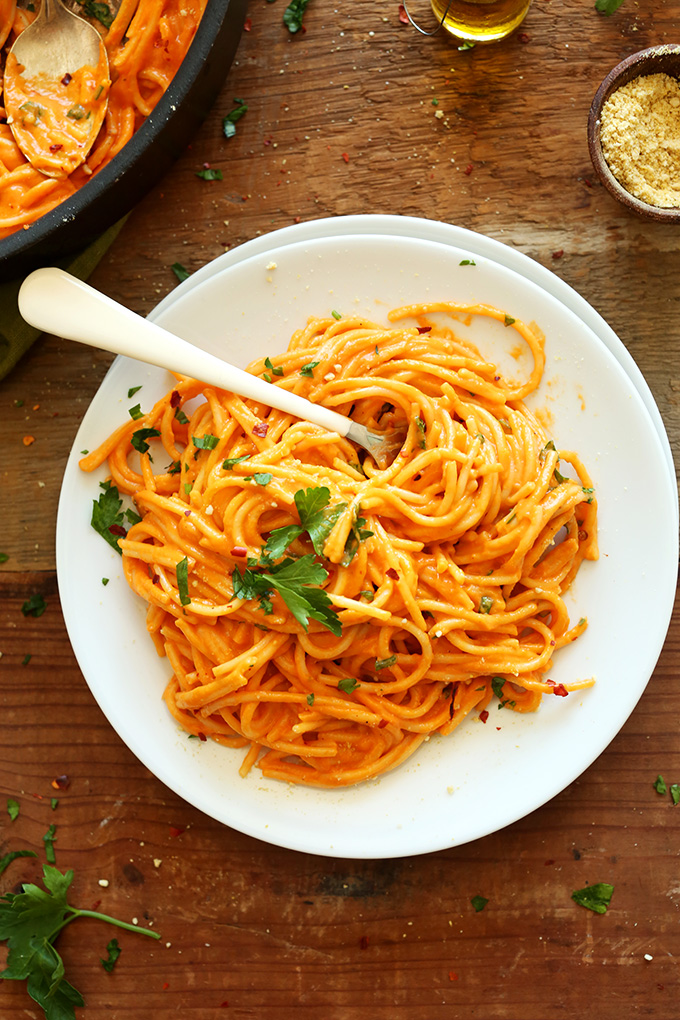 Plate of Vegan Roasted Red Pepper Pasta topped with fresh parsley