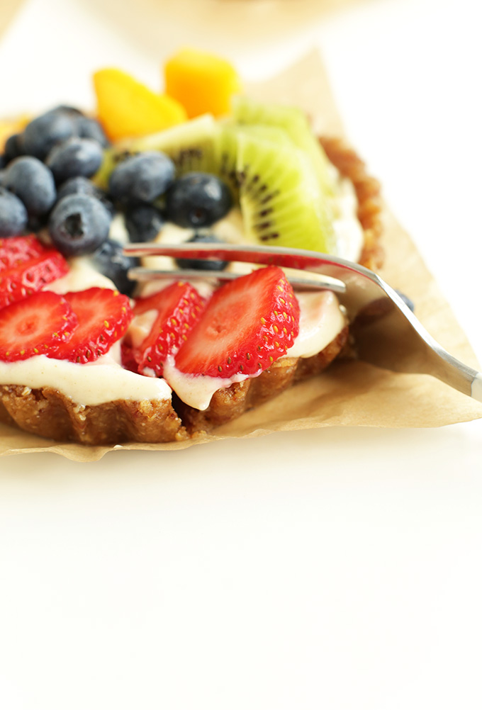 Grabbing a bite of our Lemon Cookie Fruit Tart