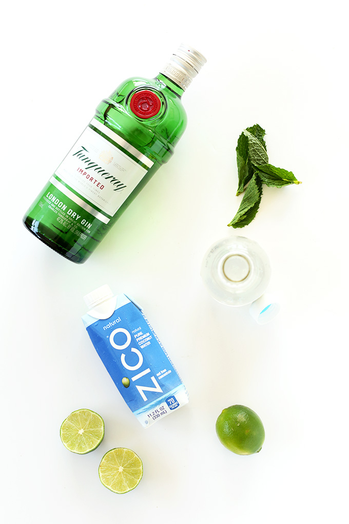 Coconut water, gin, limes, and mint for making Coconut Water Gin and Tonics