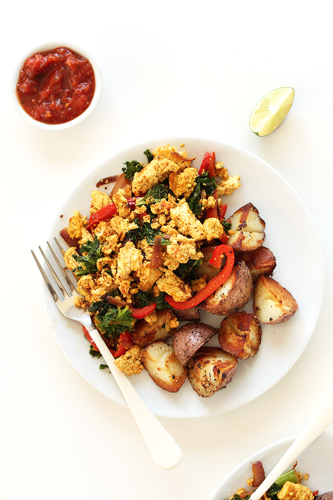 Breakfast plate of scrambled tofu and veggies plus roasted potatoes