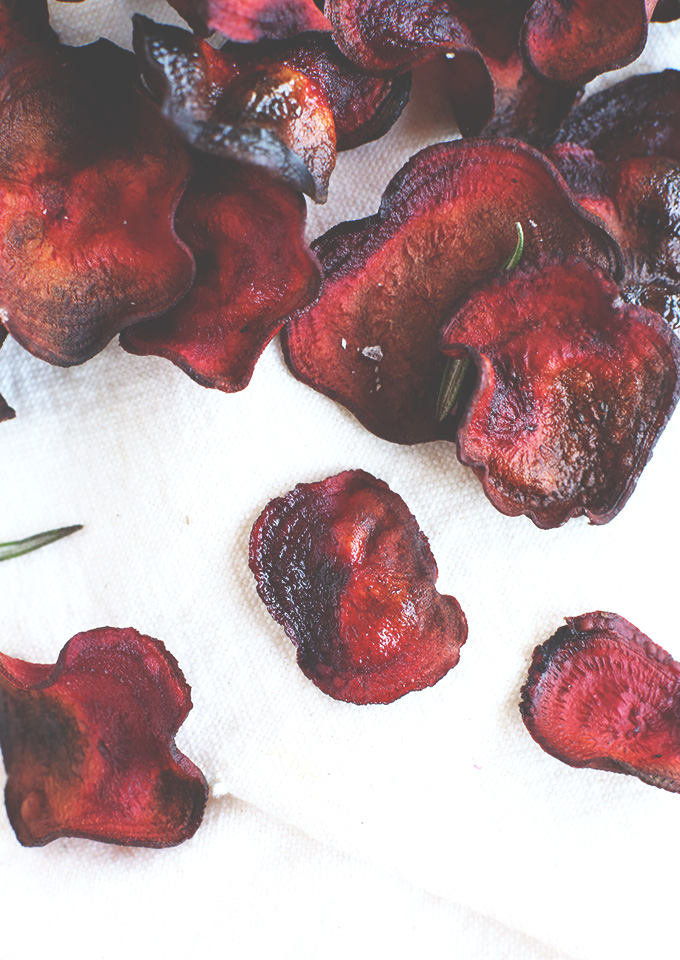 Freshly baked Rosemary Beet Chips resting on fabric