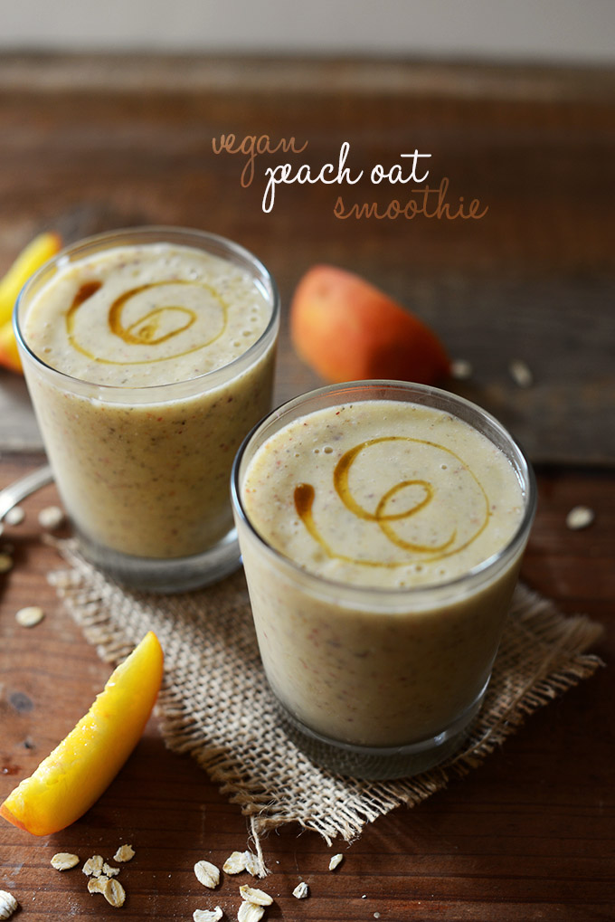 Two glasses of our Vegan Peach Oat Smoothie recipe