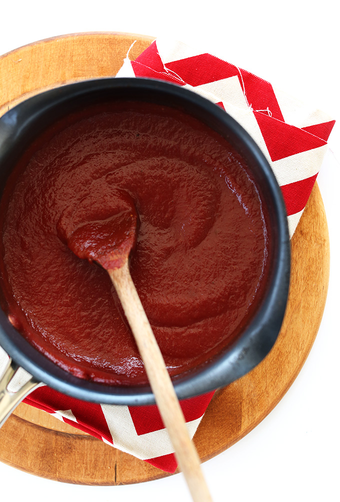Cooking homemade Whiskey BBQ Ketchup in a saucepan