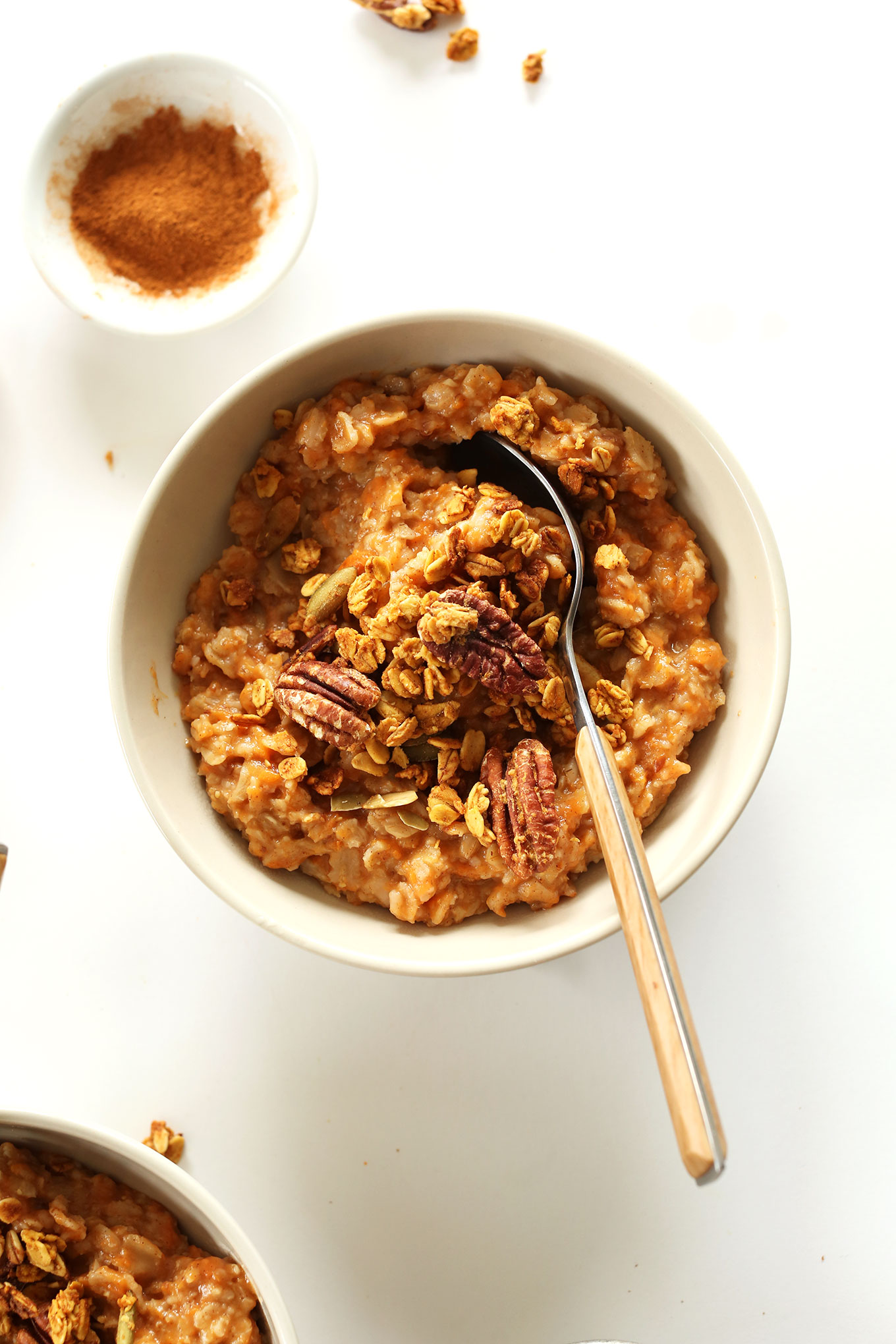 Bowl of our delicious Sweet Potato Pie Oats topped with pecans