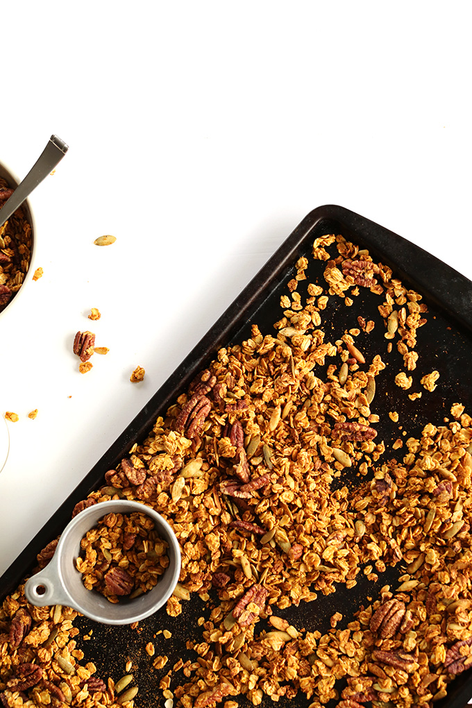 Baking sheet filled with a batch of our gluten-free vegan Maple Pecan Granola recipe