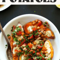 Bowl of Mediterranean Baked Sweet Potatoes with text above it that says ready in 30 minutes