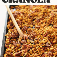 Baking sheet of Pumpkin Maple Pecan Granola with text above it that says vegan and gluten-free