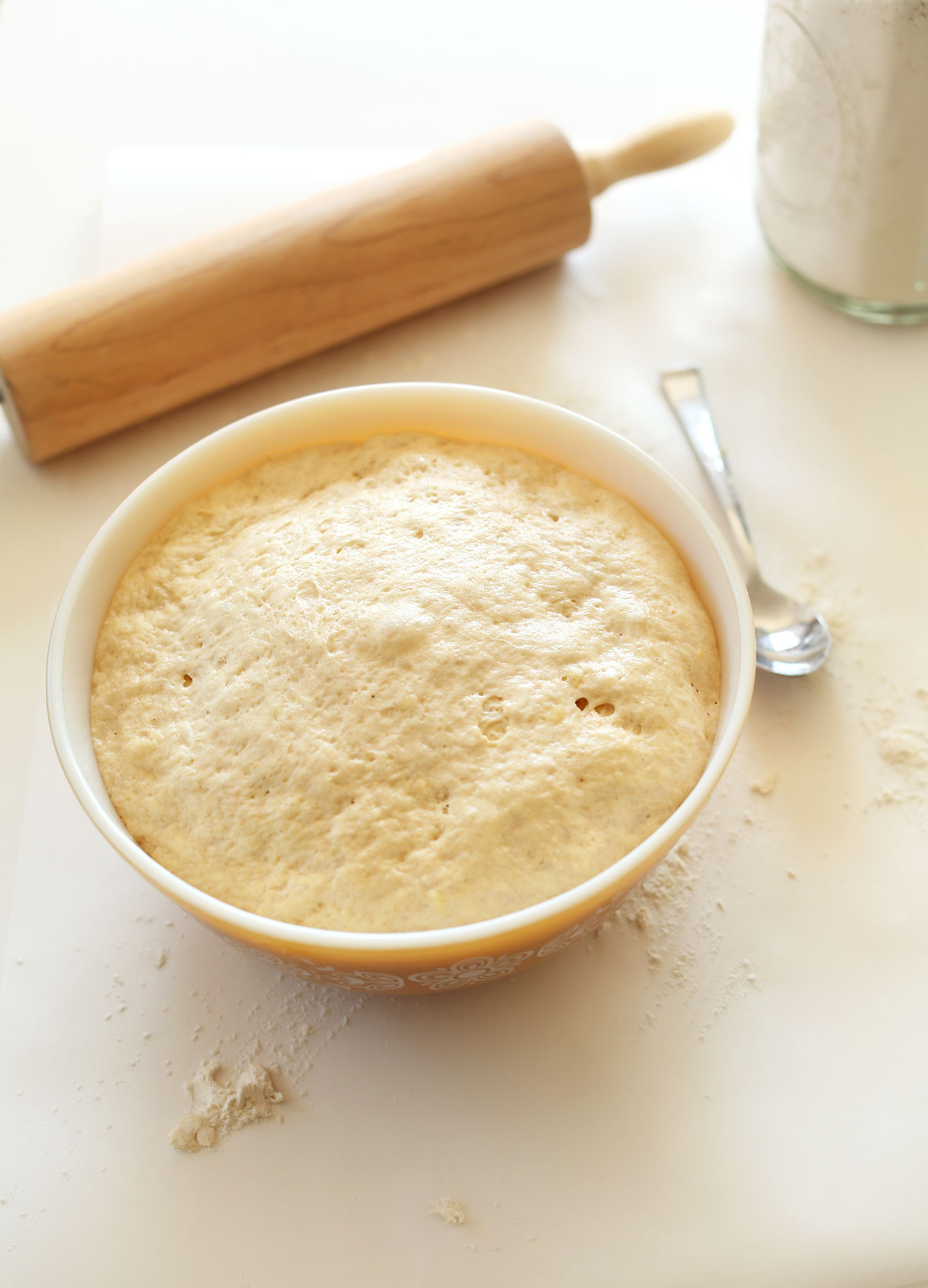 Bowl of freshly risen batter for homemade Pumpkin Cinnamon Rolls