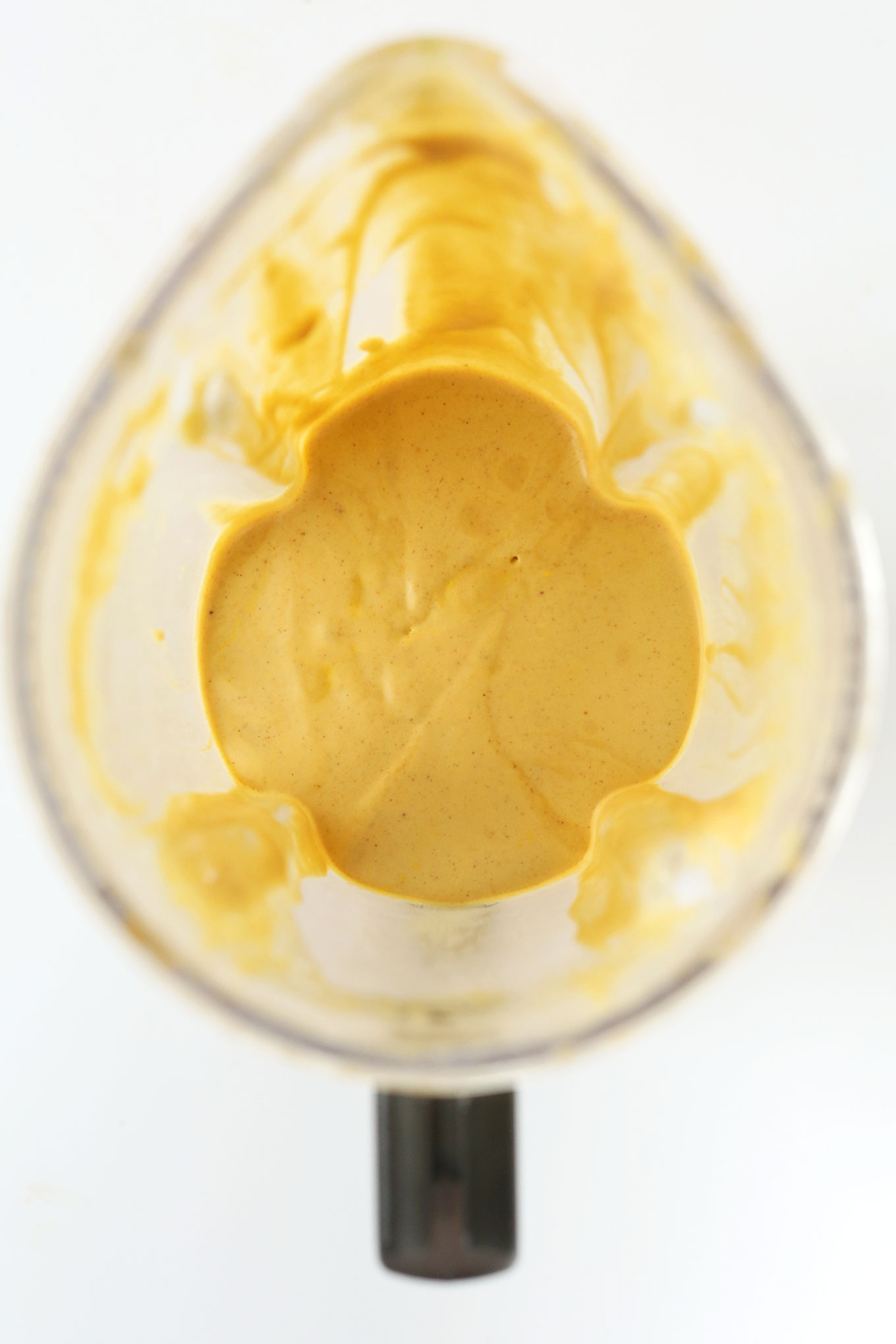 Blender with creamy vegan Pumpkin Bourbon Milkshake