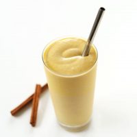 Glass of vegan Pumpkin Bourbon Milkshake