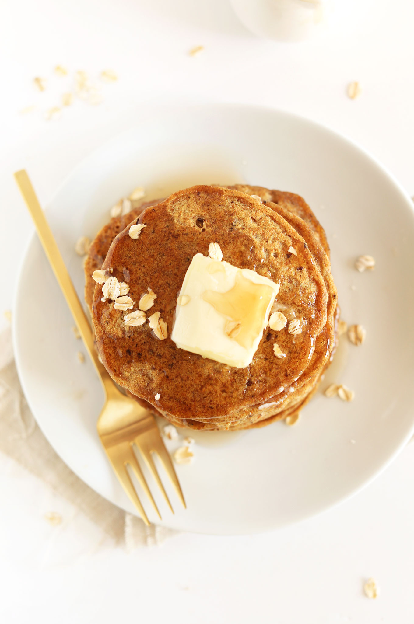 Stack of fluffy Whole Grain Vegan Pancakes made with spelt flour
