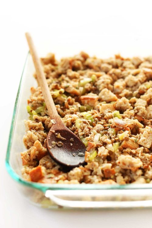 Baking dish filled with vegan stuffing for Thanksgiving and fall