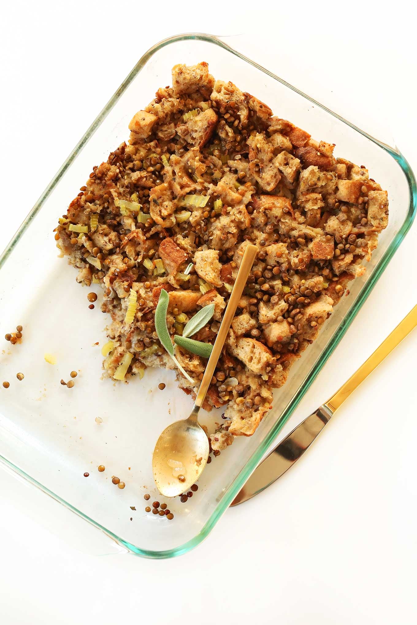 Half eaten tray of simple vegan stuffing for Thanksgiving
