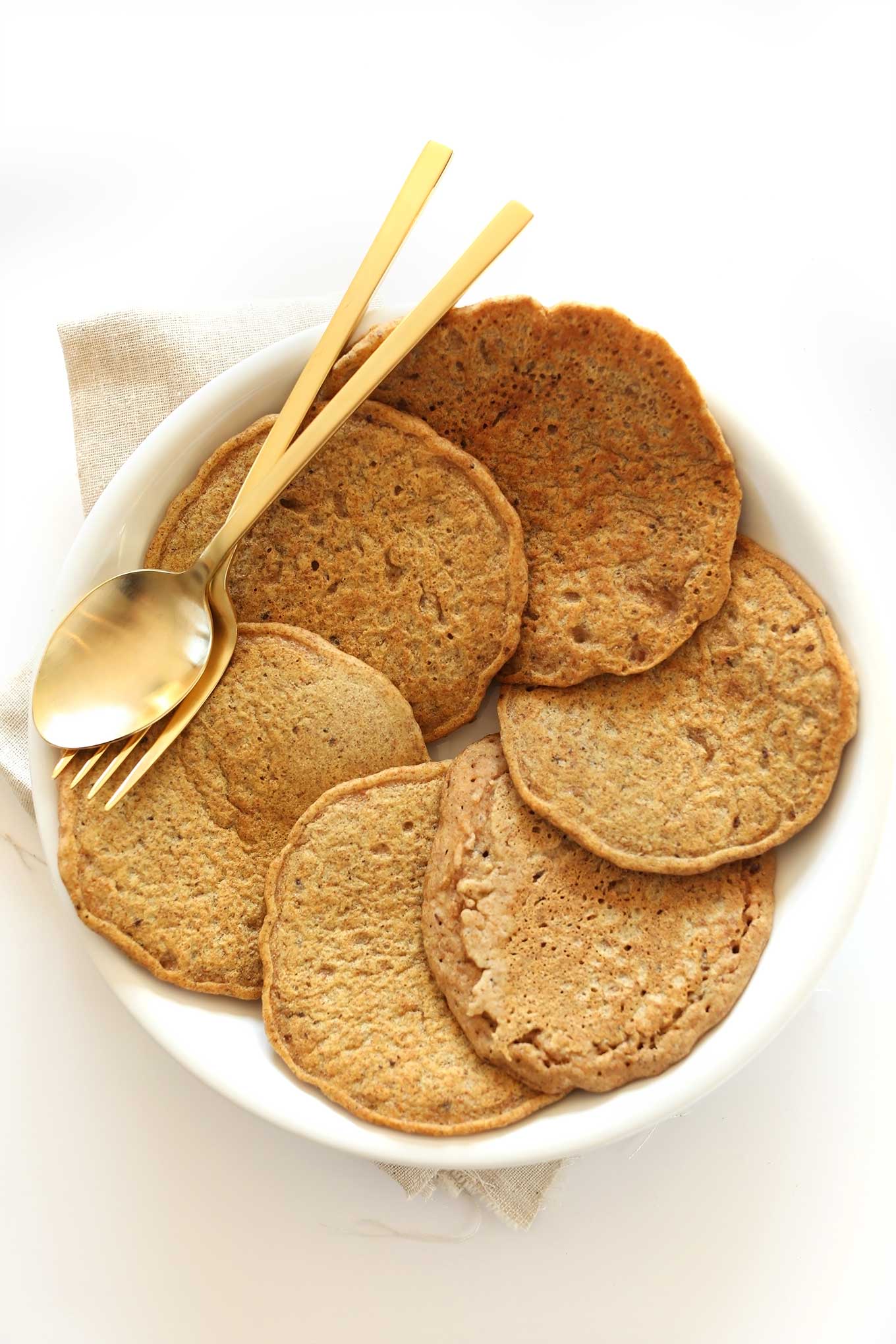 Plate of Whole Grain, Healthy Pancakes for a weekend vegan breakfast