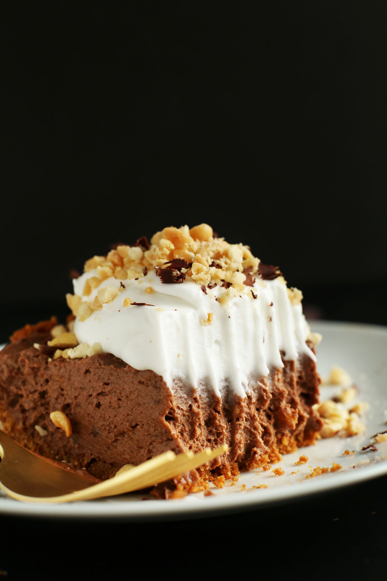 Half-eaten slice of Vegan Chocolate Peanut Butter Mousse Pie