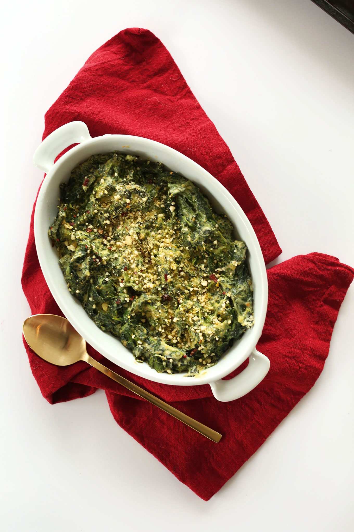 Ceramic dish filled with our fast and healthy Kale and Spinach Dip