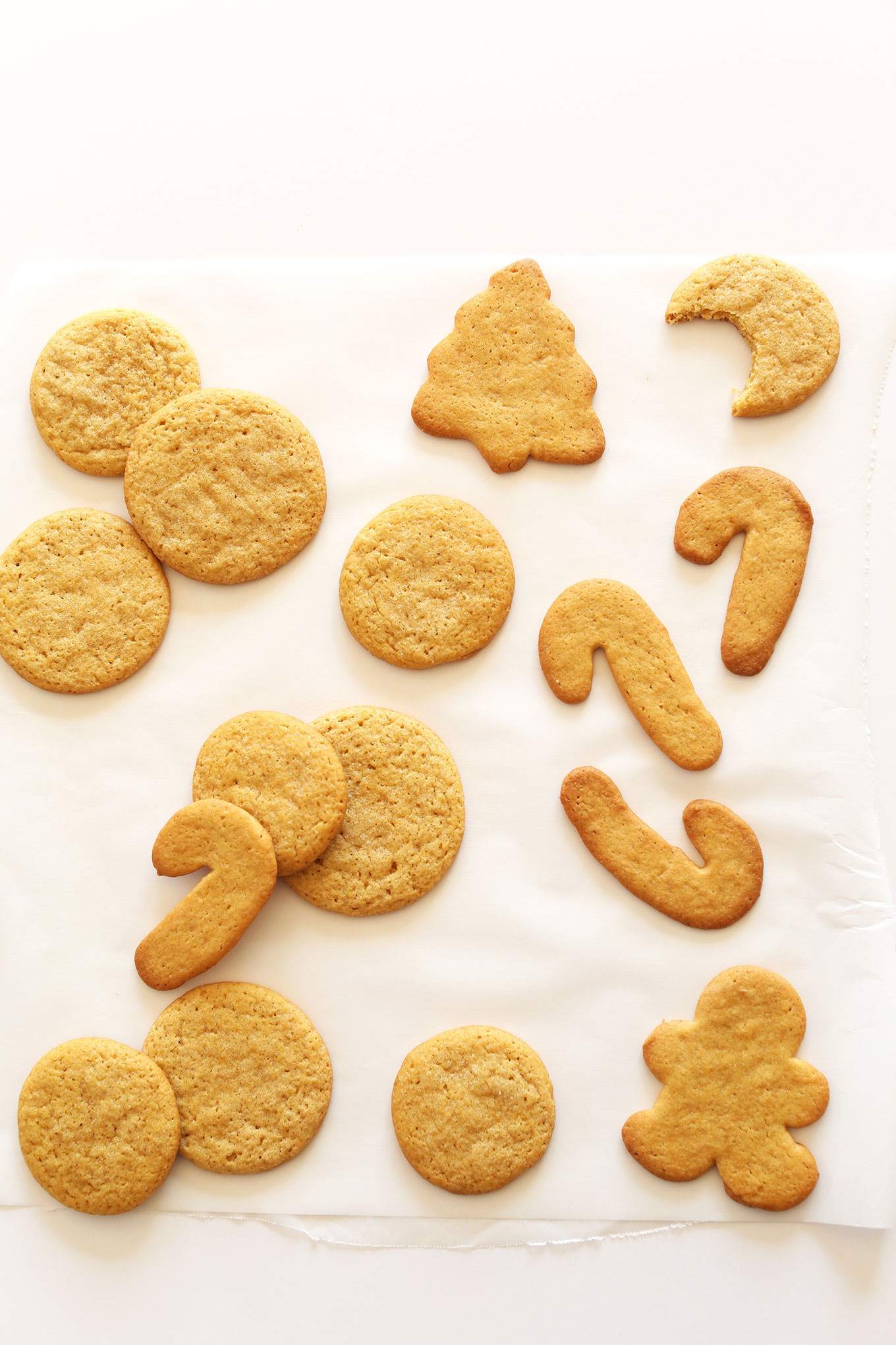 Freshly baked Vegan Sugar Cookies resting on parchment paper