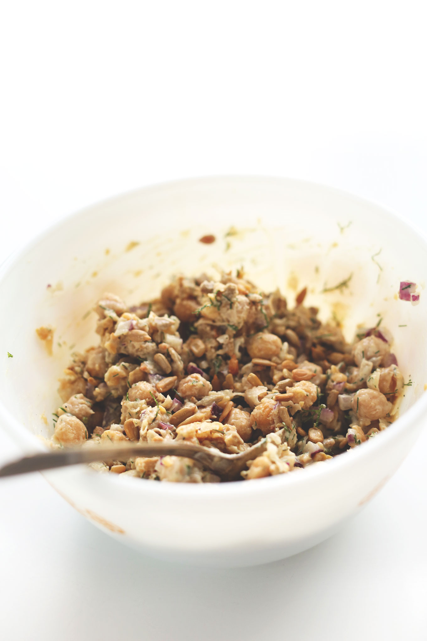 Bowl of vegan Chickpea Sunflower Salad for adding to sandwiches