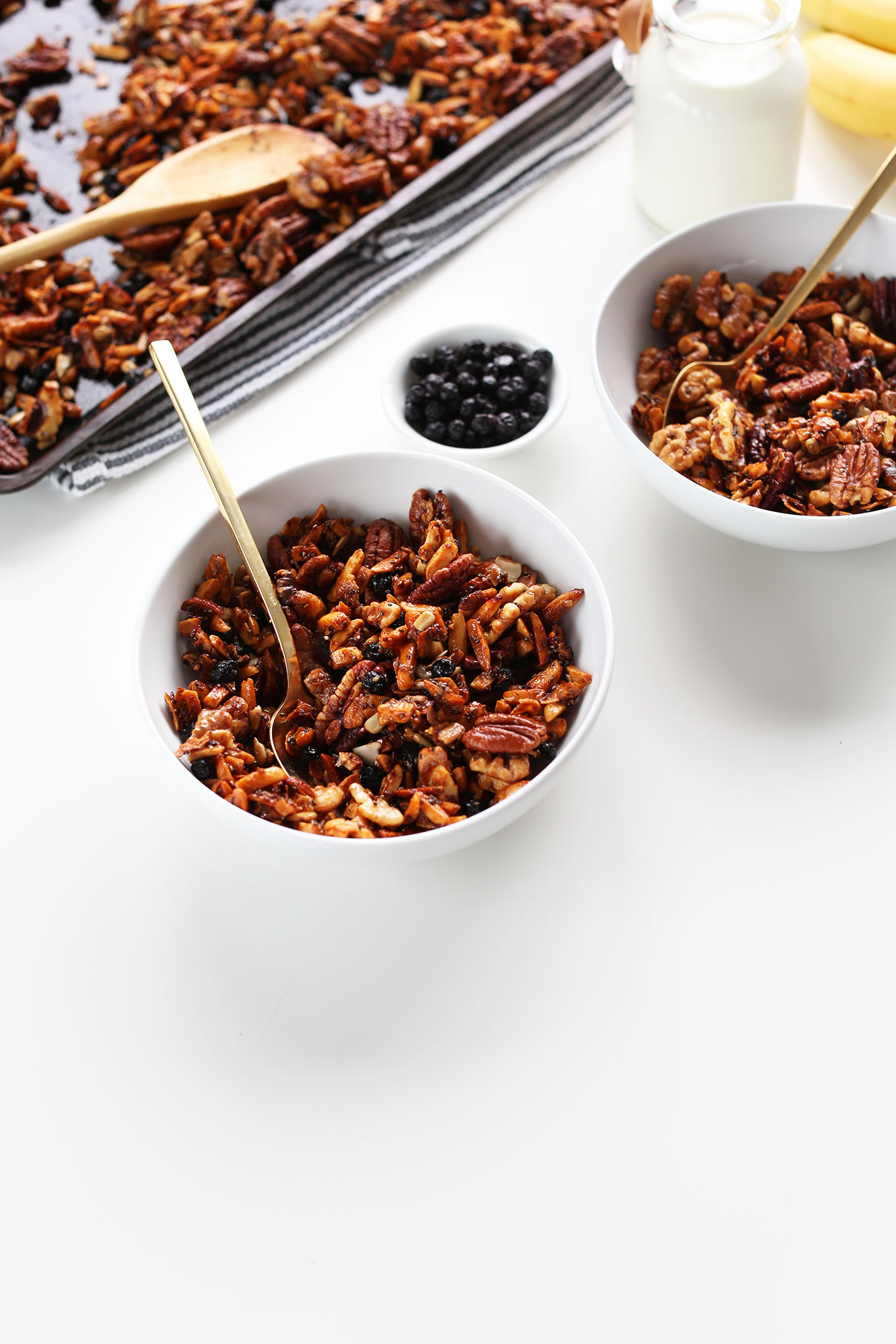 Bowls of our amazing vegan Grain-Free Granola recipe with dried blueberries