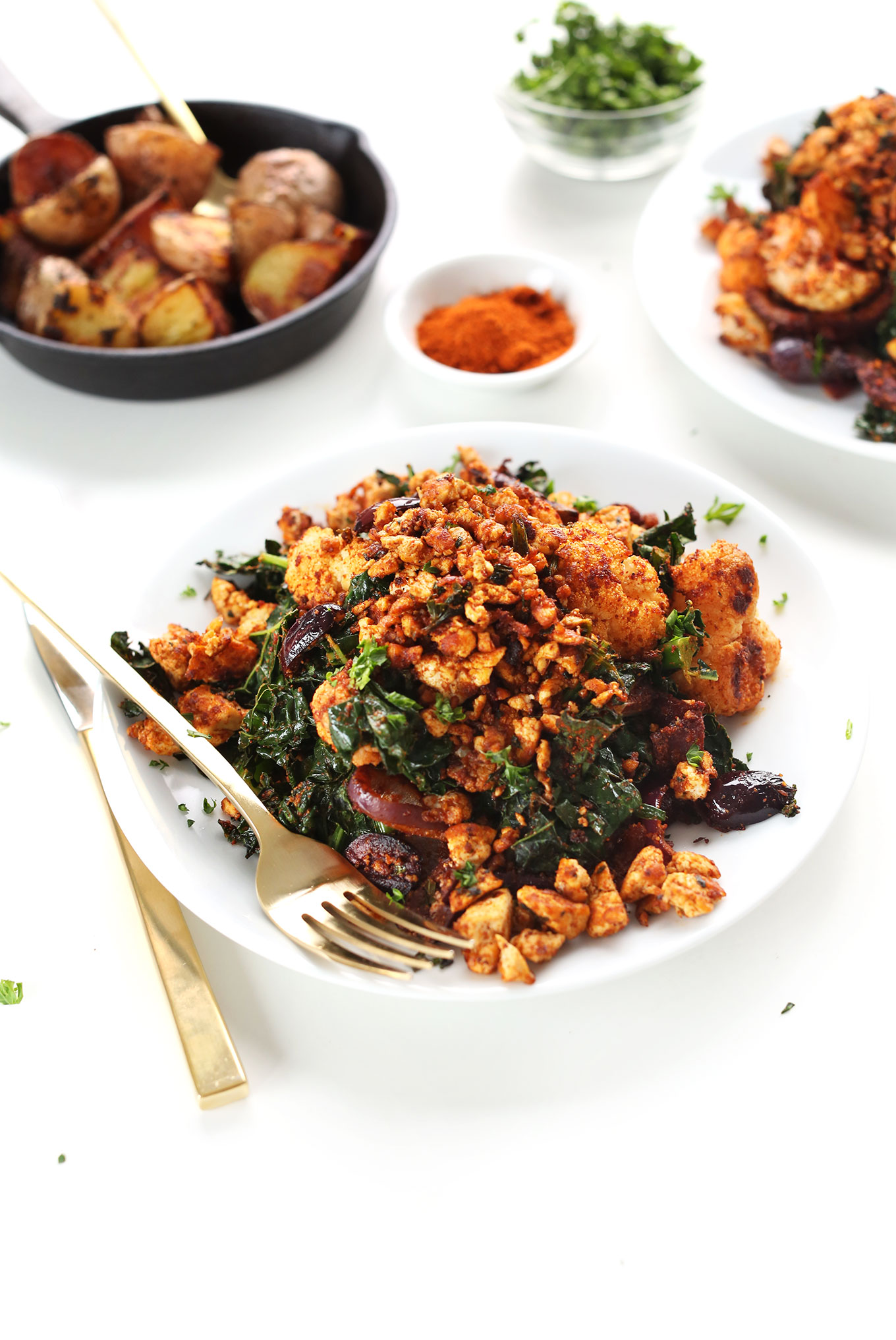 Plate filled with Masala-spiced Tofu Scramble for a filling vegan breakfast