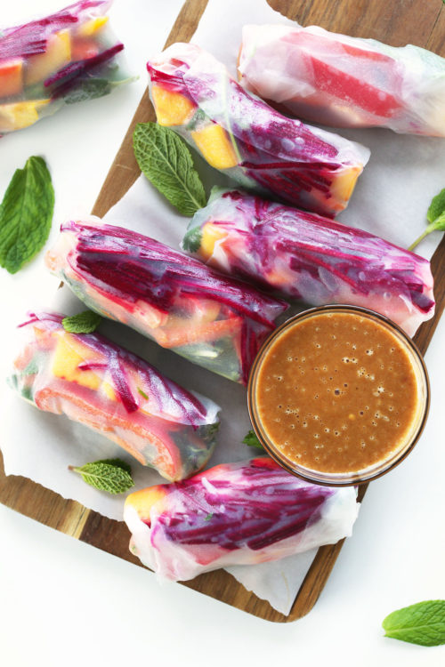 Platter of gluten-free vegan Spring Rolls with Ginger Peanut Sauce