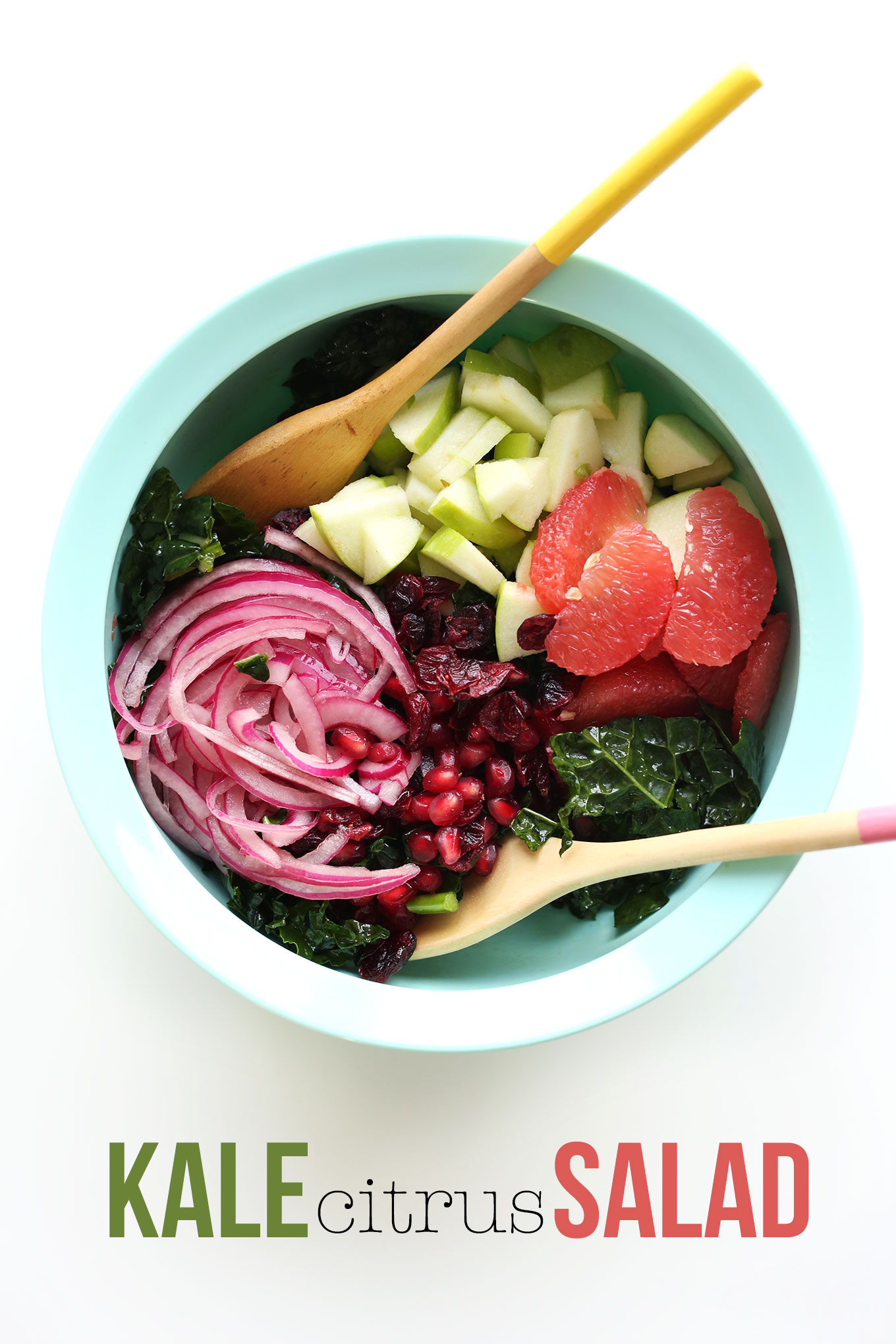 Mixing bowl filled with ingredients for making an amazing Detox Kale Citrus Salad