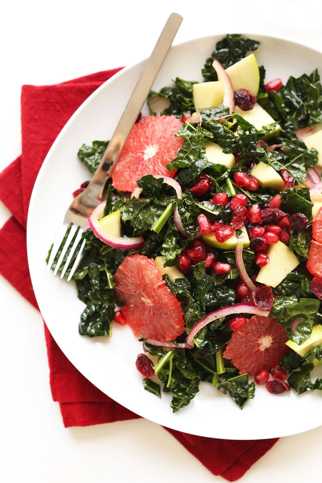 Plate of Citrus Kale Salad made with a tangy Red Wine Vinaigrette