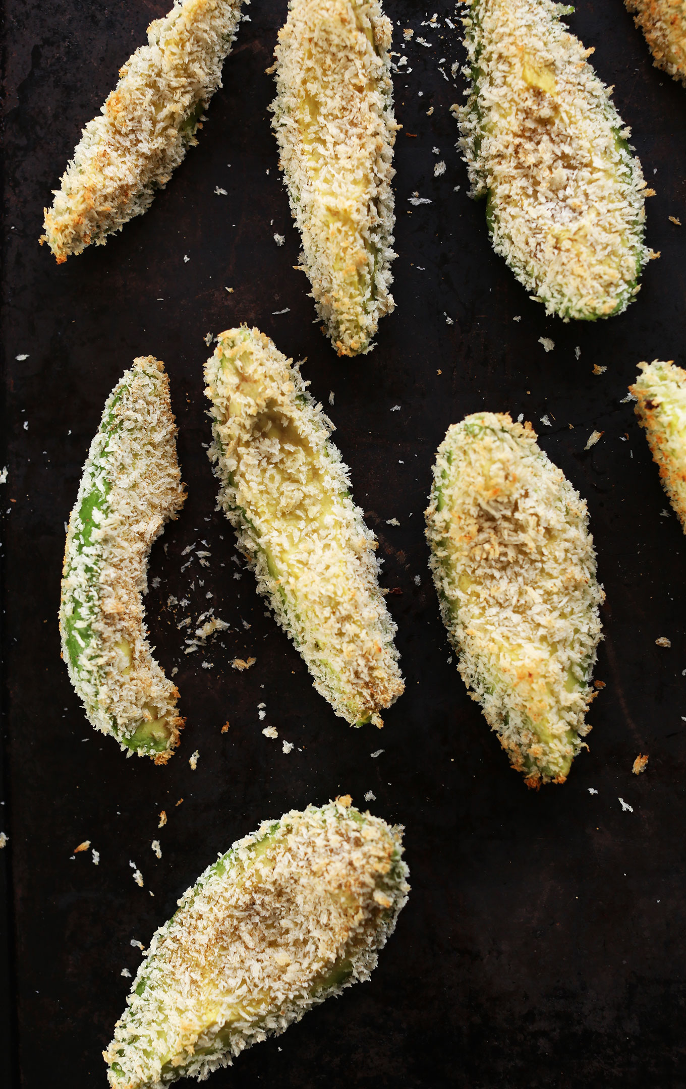 Baking sheet filled with Panko Baked Avocados