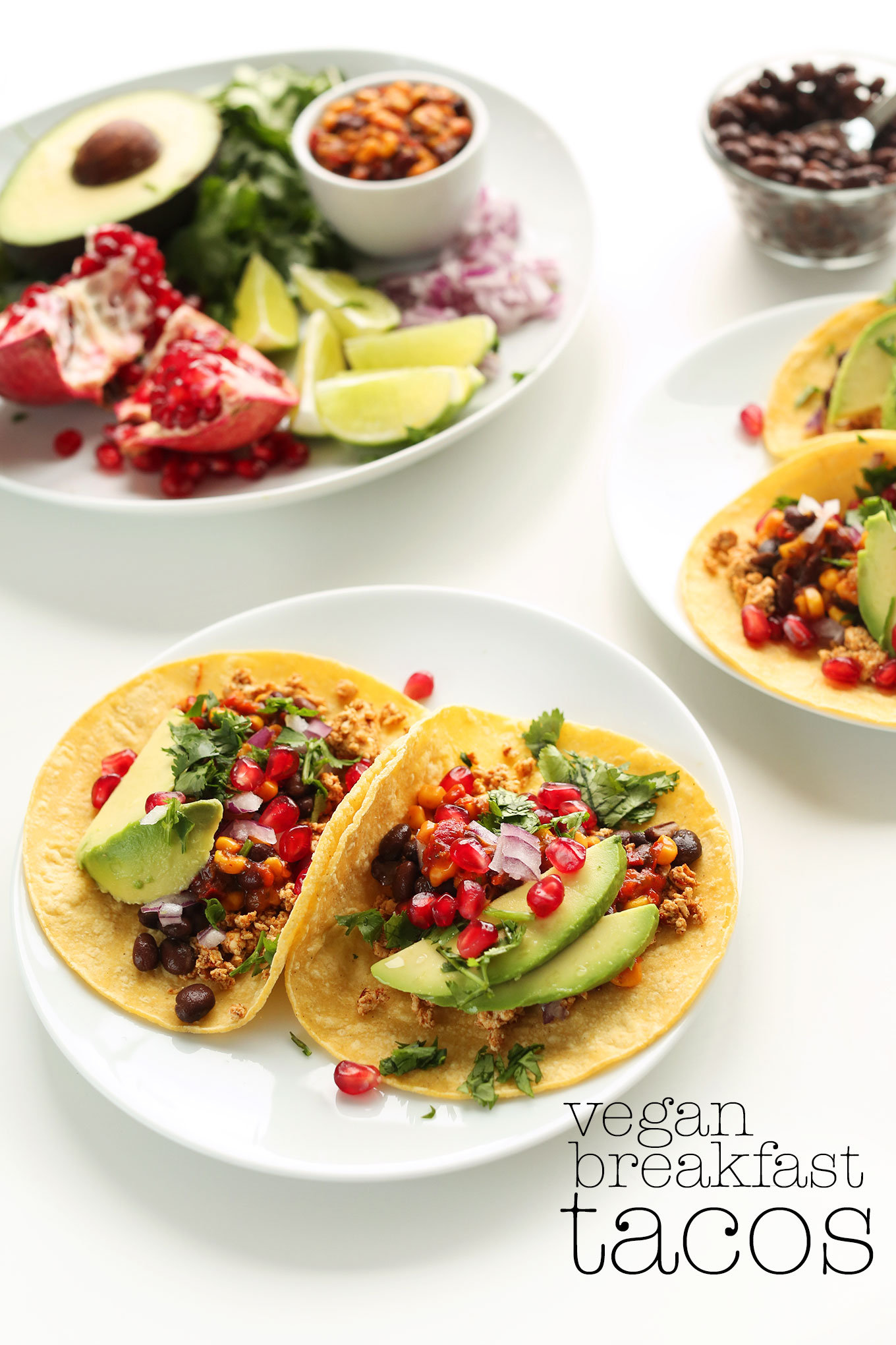 Vegan Breakfast Tacos with tofu, pomegranate, avocado, and cilantro