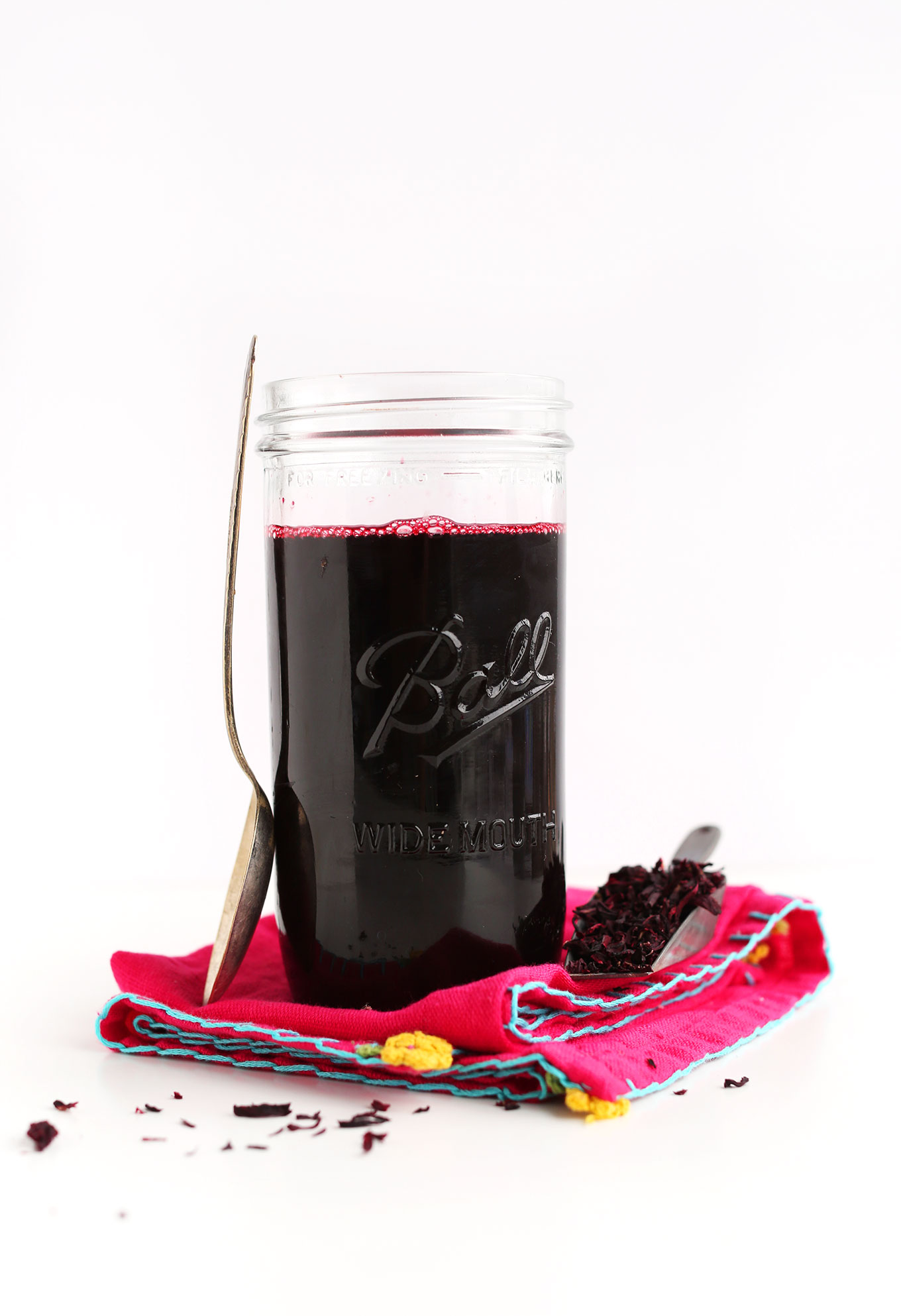 Glass jar of Hibiscus Tea Concentrate