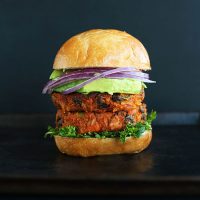 Two Sweet Potato Black Bean Burgers in a bun