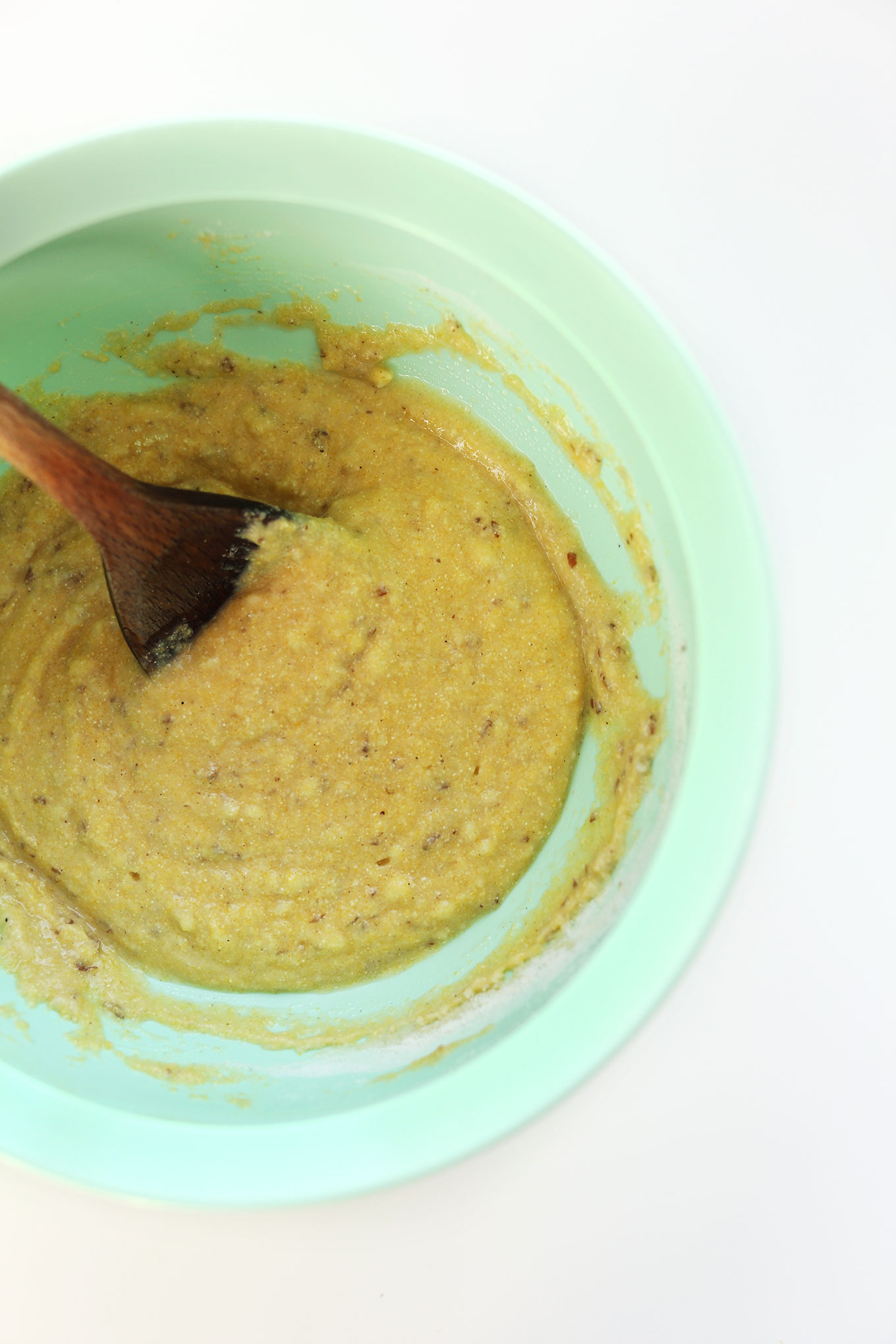 Stirring together ingredients for a small batch of vegan cornbread