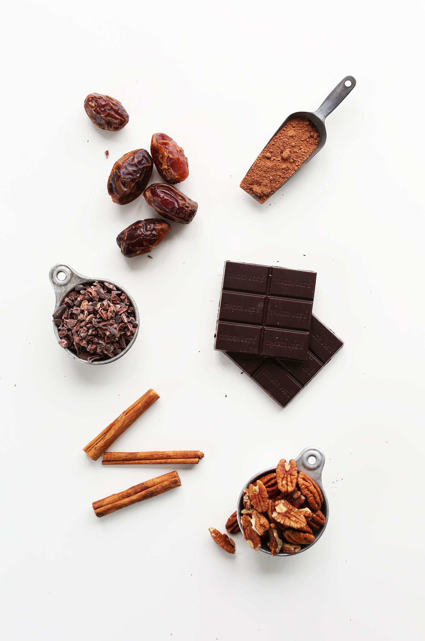 Cinnamon, pecans, dark chocolate, cocoa powder, dates, and cacao nibs