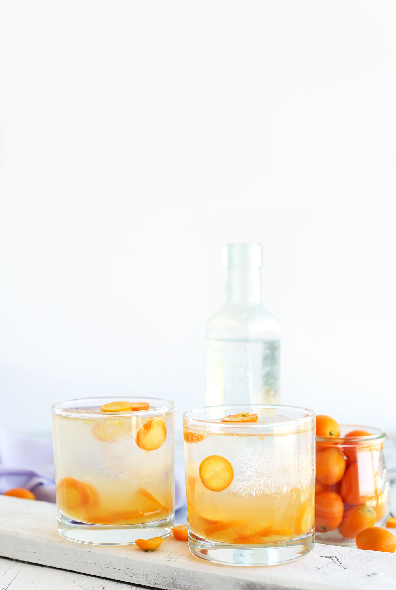 Two glasses of our refreshing and simple Kumquat Gin and Tonic