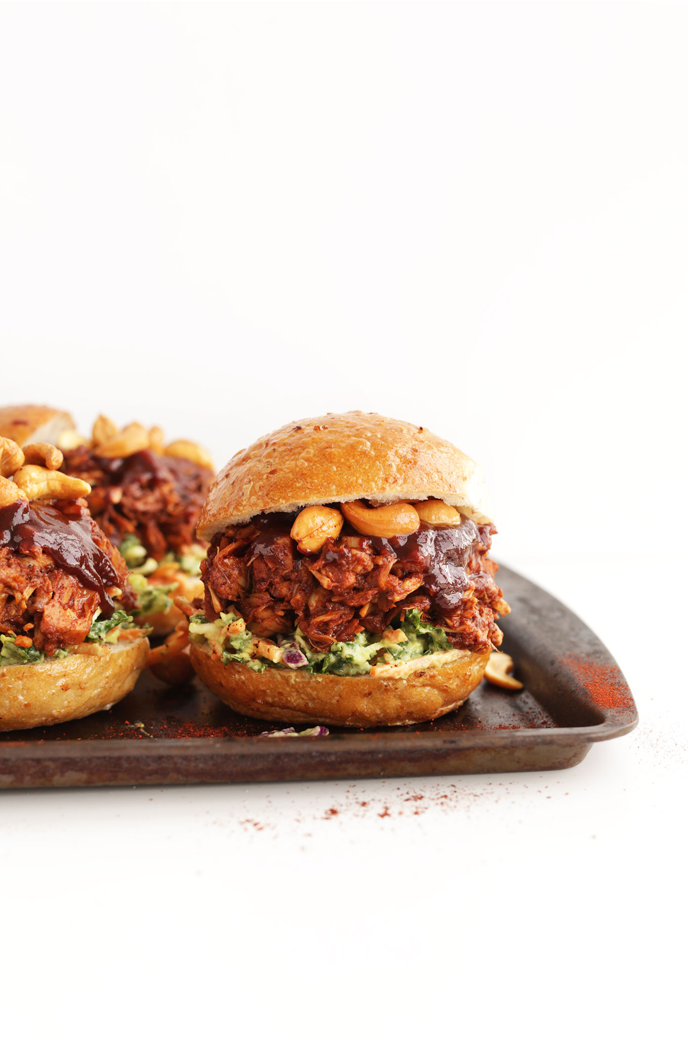 Baking sheet filled with our BBQ Jackfruit Sandwiches with Avocado Slaw and Roasted Cashews
