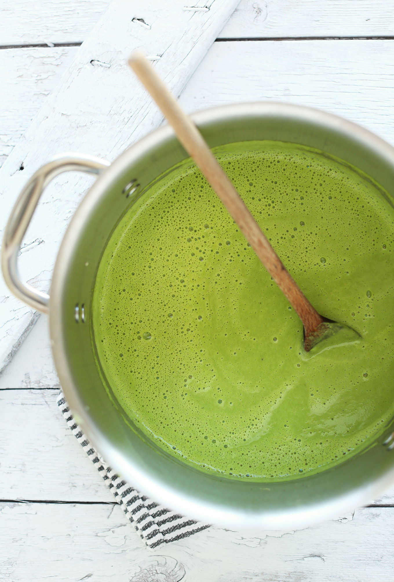 Big soup pot filled with our Creamy Vegan Asparagus and Pea Soup